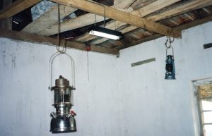Solar powered lights replace lanterns hanging from a ceiling in Sri Lanka