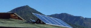 Solar panels on a rooftop in a mountainous area of Bhutan