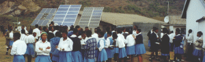 Students in the Eastern Cape of South Africa gather around new solar panels at their school