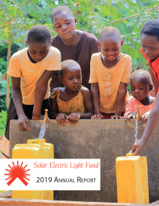 Solar Electric Light Fund (SELF) 2019 annual report cover photo with children gathered around a clean water tap