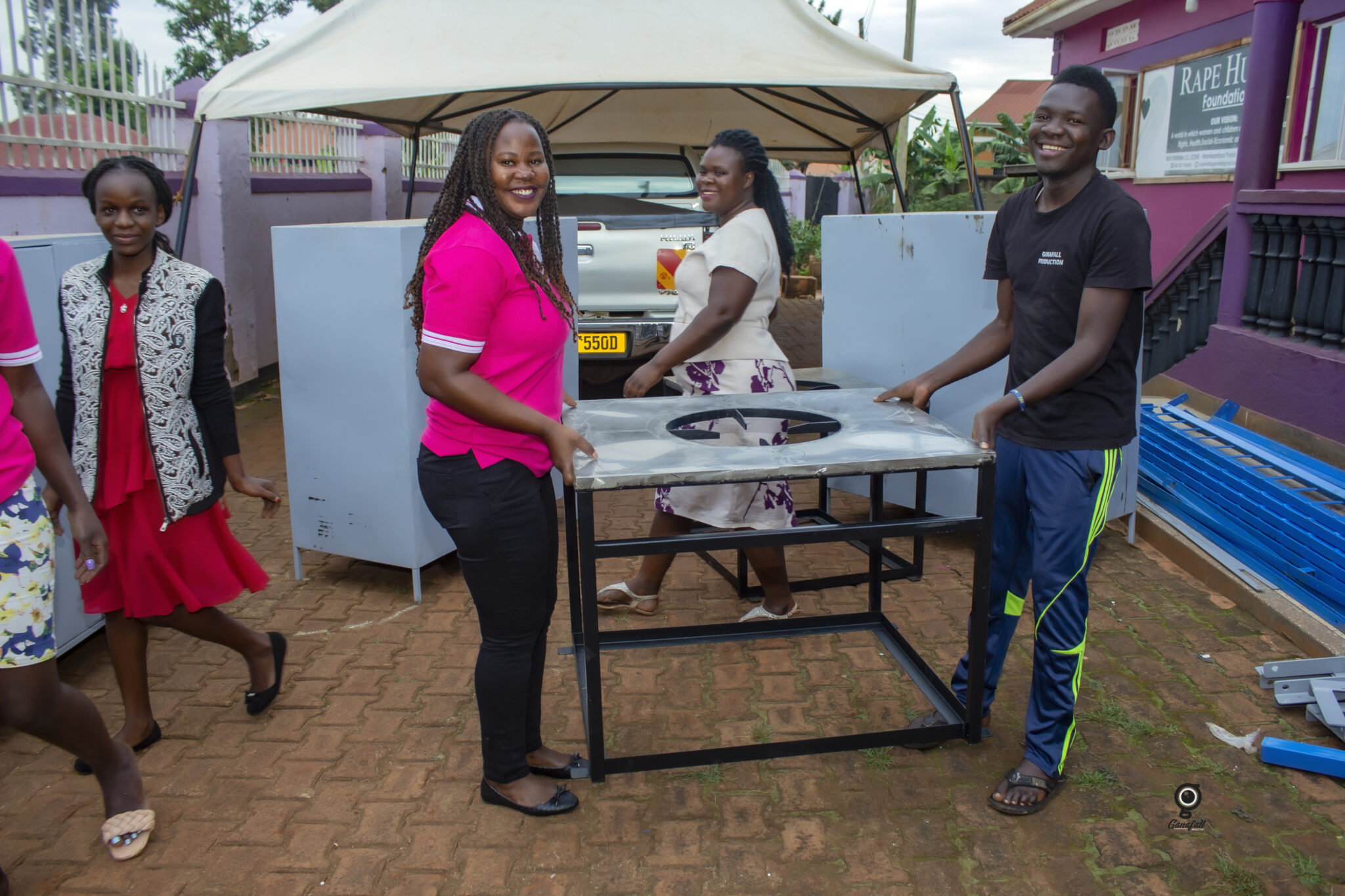Rape Hurts Foundation staff set up Lytefire solar ovens funded by the Solar Electric Light Fund