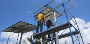 Solar technicians electrify a village in Haiti